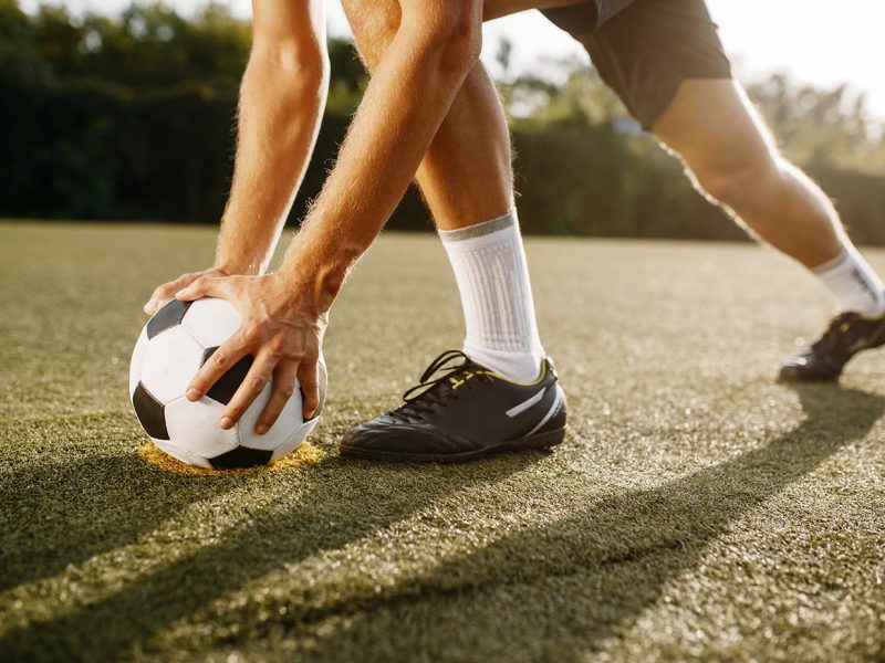male-soccer-player-prepares-to-hits-the-ball-2021-08-26-16-27-14-utc